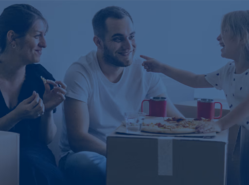 Family taking a break from moving into new apartment