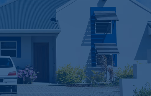 Front exterior of a home with a car parked in front