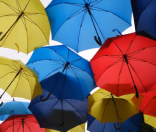 many colorful open umbrellas