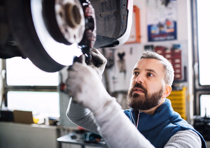 mechanic changing brakes
